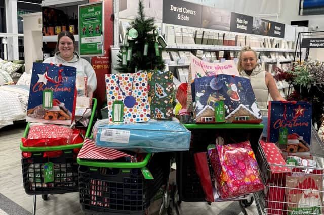 Sophie Duper (left) and her sister-in-law Michelle Dupear shopping for Jamesie’s Mission’s 2025 toy appeal.