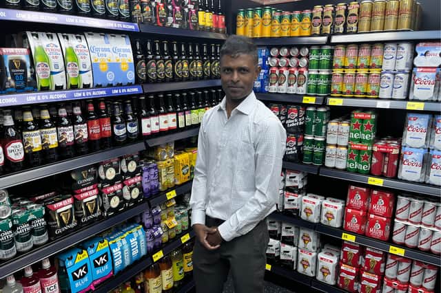 Yogendran Mutthulingam in shop's new 'beer cave'.