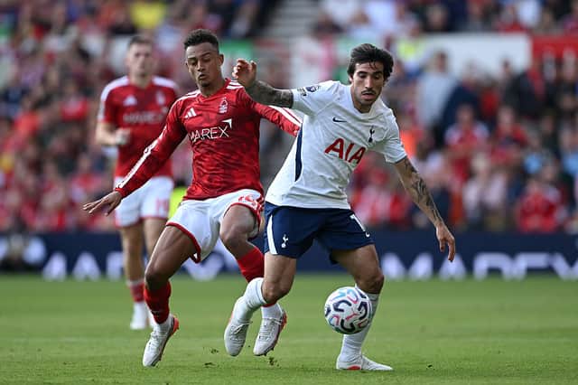 Sandro Tonali of Tottenham Hotspur is challenged by Dan Ndoye of Nottingham Forest during the Premier League 2026/27 match between Nottingham Forest FC and Tottenham Hotspur at City Ground on September 05, 2026 in Nottingham, England. (Photo by Shaun Botterill/Getty Images)