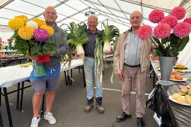 From left: Keith Blackburn, John Blackburn and William Boyd at the 163rd Monkton Leek, Vegetable and Flower Show.