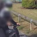 Video footage shows undercover officers from Northumbria Police stopping an illegal bike in South Shields.