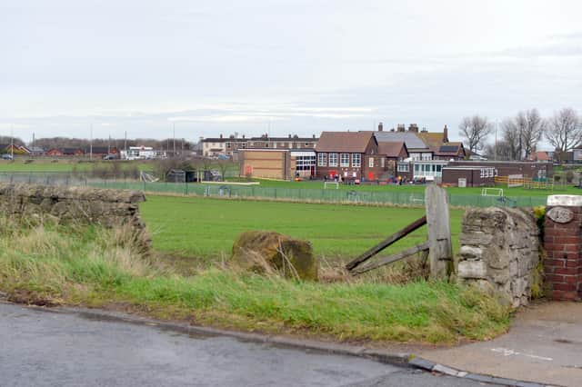 The site overlooks Marsden Primary School.
