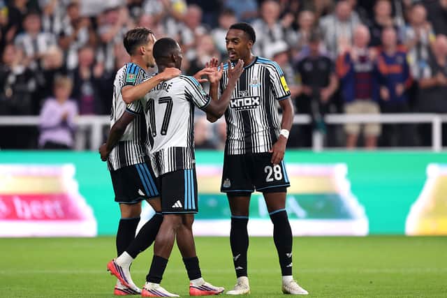 Bazoumana Toure of Newcastle United celebrates scoring his team’s first goal with teammates during the Carabao Cup Second Round match between Newcastle United and West Bromwich Albion at St James' Park on August 26, 2026 in Newcastle upon Tyne, England. (Photo by George Wood/Getty Images)