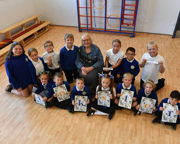 Carol Inkster with pupils at Toner Avenue Primary School.
