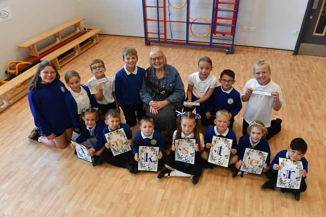 Carol Inkster with pupils at Toner Avenue Primary School.