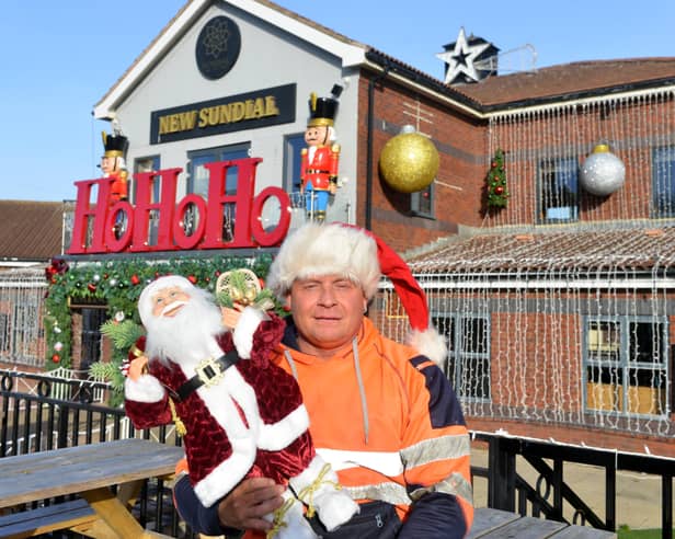 Omar Ames, landlord at The New Sundial, during his Christmas preparations in 2024.