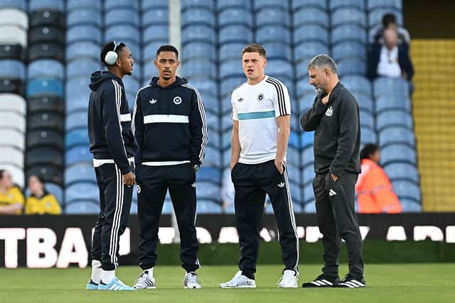 Newcastle United's English midfielder #41 Jacob Ramsey (2L) and Newcastle United's English midfielder #11 Harvey Barnes (2R) inspect the pitch before the English Premier League football match between Leeds United and Newcastle United at Elland Road in Leeds, northern England on September 14, 2026. (Photo by Paul ELLIS / AFP via Getty Images)