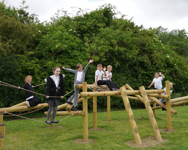 Pupils at Forest View Primary School, in South Shields, enjoying their new outdoor play equipment following a £10,000 donation from TT2, the operator of the Tyne Tunnels.