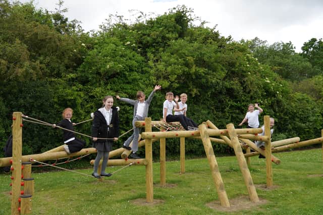 Pupils at Forest View Primary School, in South Shields, enjoying their new outdoor play equipment following a £10,000 donation from TT2, the operator of the Tyne Tunnels.