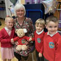 Harton Primary School nursery teacher Carolyn Reay  was pictured with pupils Elia, Reuben and Louie four years ago.