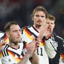 Malick Thiaw, Nick Woltemade and Florian Wirtz of Germany applaud the fans following their win, during the FIFA World Cup 2026 qualifier match between Luxembourg and Germany at Stade de Luxembourg on November 14, 2025 in Luxembourg, Luxembourg. (Photo by Alexander Hassenstein/Getty Images)