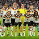 Germany's players (Back row, From L) Germany's midfielder #09 Derry Scherhant, Germany's defender Malick Thiaw, Germany's forward #11 Nick Woltemade, Germany's goalkeeper #01 Jonas Urbig, Germany's defender #03 Waldemar Anton and Germany's midfielder #05 Aleksandar Pavlovic  (Front row, From L) Germany's defender #13 Philipp Treu, Germany's defender #18 Maxmilian Mittelstadt, Germany's midfielder #17 Florian Wirtz, Germany's midfielder #08 Tom Bischof and Germany's forward #20 Serge Gnabry pose for the team photo prior to the UEFA Nations League Group A2 between Germany and Serbia at the Allianz Arena in Munich, southern Germany on October 1, 2026. (Photo by Karl-Josef HILDENBRAND / AFP via Getty Images)
