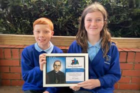 St James Catholic Primary School pupils with the Oscar Romero Award.