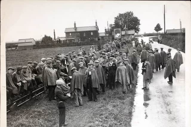 The Jarrow marchers on a rainy day in 1936. (Photo by Hulton Archive/Getty Images)