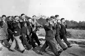 The mouth organ band leads the way as the Jarrow marchers continue their journey to London.    (Photo by Central Press/Getty Images)