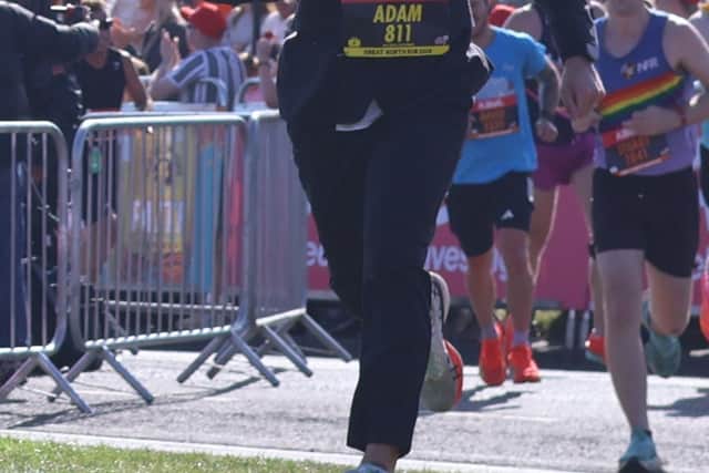 Adam McKenna ran the Great North Run wearing a suit.