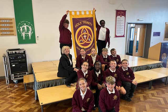 Headteacher Tina Murphy and pupils at Holy Trinity Church of England Academy are celebrating their Ofsted success.