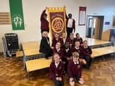 Headteacher Tina Murphy and pupils at Holy Trinity Church of England Academy are celebrating their Ofsted success.