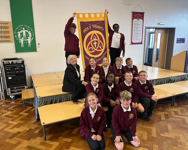 Headteacher Tina Murphy and pupils at Holy Trinity Church of England Academy are celebrating their Ofsted success.