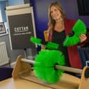 Susan Stewart, Sales Manager at Cottam Brush, with the patent-pending SPLITGRIP system.