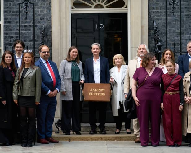 Kate Osborne, MP for Jarrow and Gateshead East, with descendants of the Jarrow Marchers outside of Number 10 Downing Street.