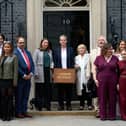Kate Osborne, MP for Jarrow and Gateshead East, with descendants of the Jarrow Marchers outside of Number 10 Downing Street.
