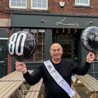 Eighty cheers for one of area's longest-serving waiters