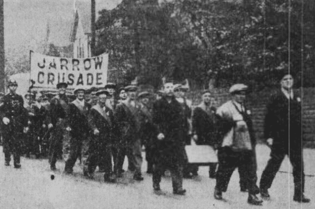 The Jarrow marchers pictured in formation on a road near Nottingham in 1936.