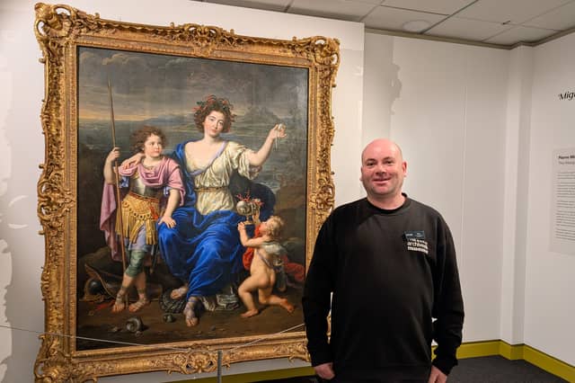 Rory Brady next to the Mignard painting featuring his 17th Century relative.