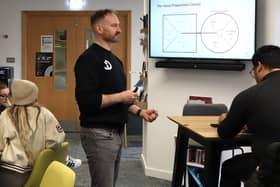 Ian Farrar coaching students.