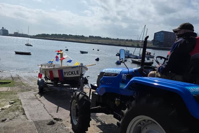 The Pickle is slowly manoeuvred into position to enter the River Tyne for the first time.