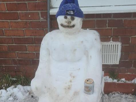Stephen Rowley's snowman relaxed with a warm hat and a can of beer.