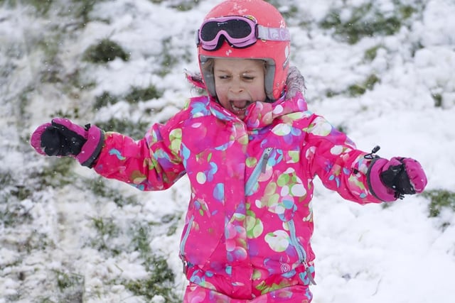 Mariela Ashby, 7, looked a little overwhelmed as she tried out her skis in the snow