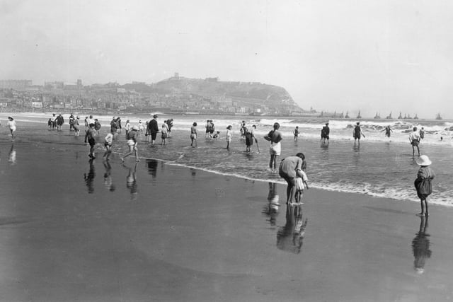 31st May 1923: Paddling on South Sands, Scarborough, Yorkshire.