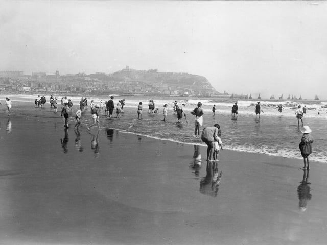 31st May 1923: Paddling on South Sands, Scarborough, Yorkshire.