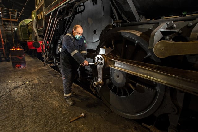 Engineer Adrian Dennis at work in the engine shed