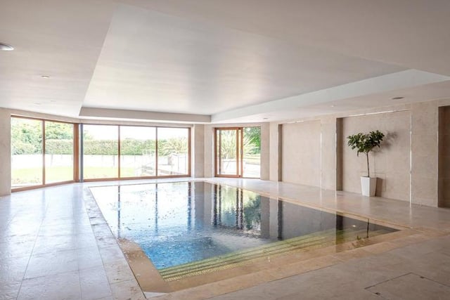 Four bedroom detached house which extends to approximately 5500 sq ft and offers a private indoor pool, as well as two bedroom guest annex. On the market for £2,500,000. Agent: Furnell Residential, Leeds.