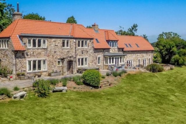 Six bedroom detached house sat in gardens and grounds of about five acres. On the market for £1,795,000. Agent: Carter Jonas, Harrogate.