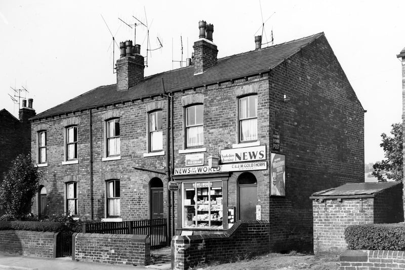 Cow Close Road in October 1969. In view is a newsagents run by C. & J.M. Goldthorpe. Advertisements for News of the World and the Yorkshire Evening News are visible along with posters for Lyons Maid ice cream and Windowlene spray.
