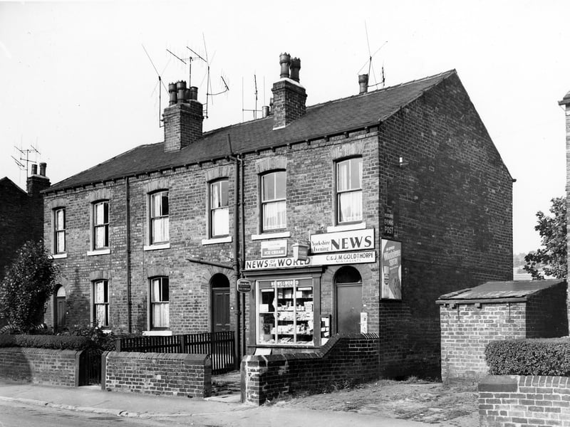 Cow Close Road in October 1969. In view is a newsagents run by C. & J.M. Goldthorpe. Advertisements for News of the World and the Yorkshire Evening News are visible along with posters for Lyons Maid ice cream and Windowlene spray.