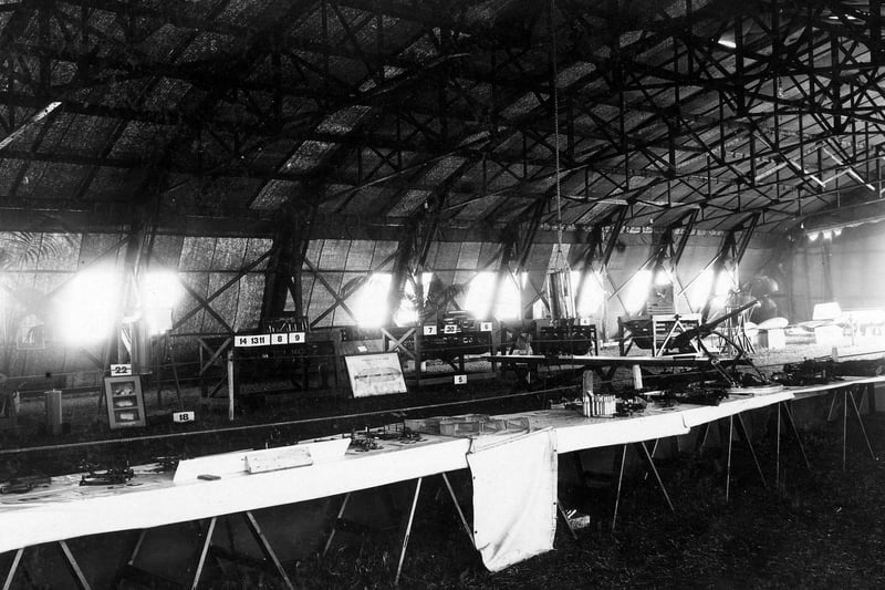 Inside Shed No. 1, which displayed the Armaments Section. On display in the metal casings at the back include a 520 lb bomb of the type carried by airships and aeroplanes for anti-submarine duties.