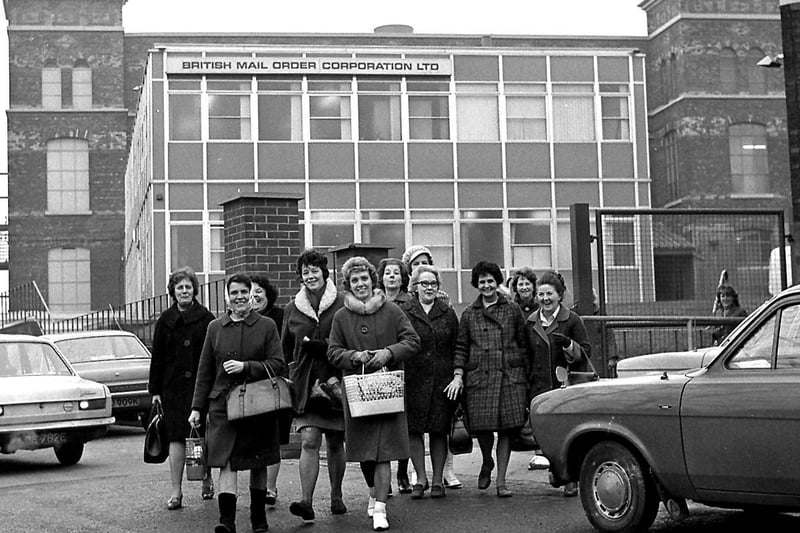 Wigan's John England office staff leaving work in January 1973