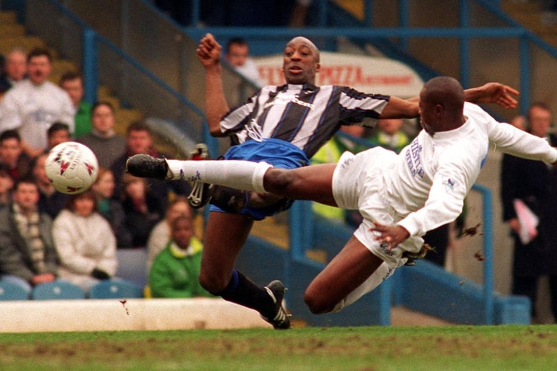 Phil Masinga and Birmingham's Chris Whyte both reach out for the ball.