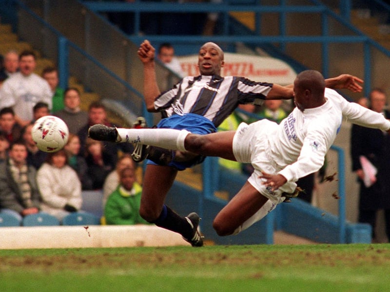 Phil Masinga and Birmingham's Chris Whyte both reach out for the ball.