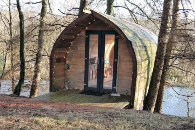 A cosy and romantic tree retreat privately elevated over a remote mill pond in rural West Yorkshire. The cabins have a kingsize sofa bed and a kitchenette, while a smaller cabin houses a flushing toilet and a spring water hand basin. There's even an al fresco shower.