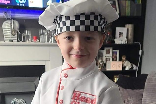Oliver dressed as a Head Chef.