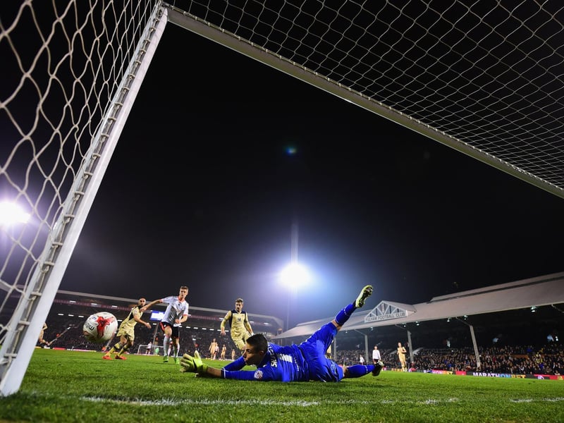 Leeds United goalkeeper Marco Silvestri makes a save.