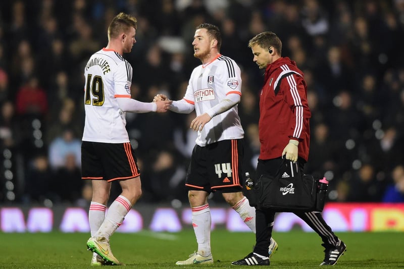 An injured Ross McCormack shakes hands with teammate Ryan Tunnicliffe as he is substituted.