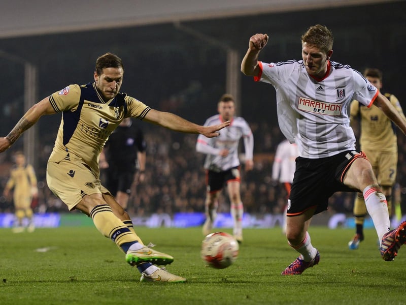 Billy Sharp's shot is blocked by Fulham's Michael Turner.