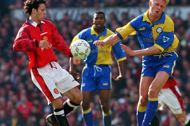Alf-Inge Haaland blocks the ball from Manchester United's Ryan Giggs during the Premier League clash at Old Trafford in May 1998. The Red Devils won 3-0.